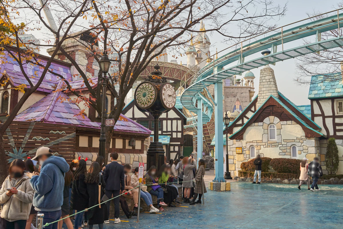 Visitors wearing Korean-style school uniforms at Lotte World