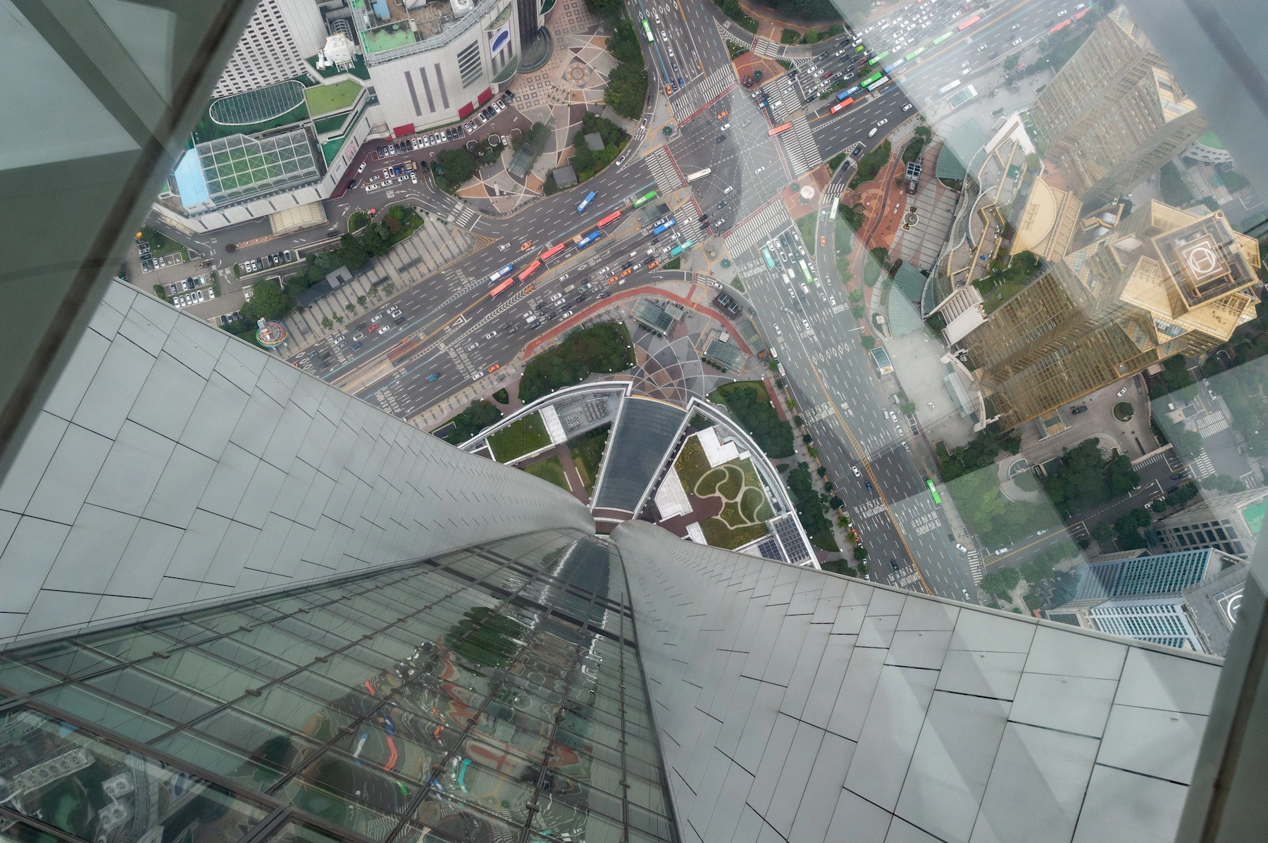 View through the glass floor at the Seoul Sky observation deck
